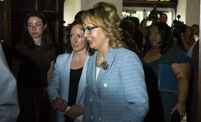 Former U.S. Rep. Gabby Giffords exits following a campaign event for Vice President Kamala Harris, Thursday, July 25, 2024 in Philadelphia. (AP Photo/Joe Lamberti)