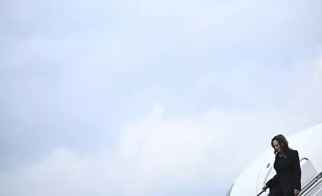 Vice President Kamala Harris steps off of Air Force Two upon arrival at Andrews Air Force Base, Md., Thursday, July 25, 2024. Harris is returning to Washington from Texas and she is scheduled to meet with Israeli Prime Minister Benjamin Netanyahu. (Brendan Smialowski/Pool via AP)