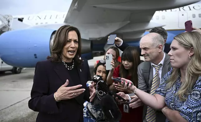 Vice President Kamala Harris speaks to reporters upon arrival at Andrews Air Force Base, Md., Thursday, July 25, 2024. Harris is returning to Washington from Texas and she is scheduled to meet with Israeli Prime Minister Benjamin Netanyahu. (Brendan Smialowski/Pool via AP)