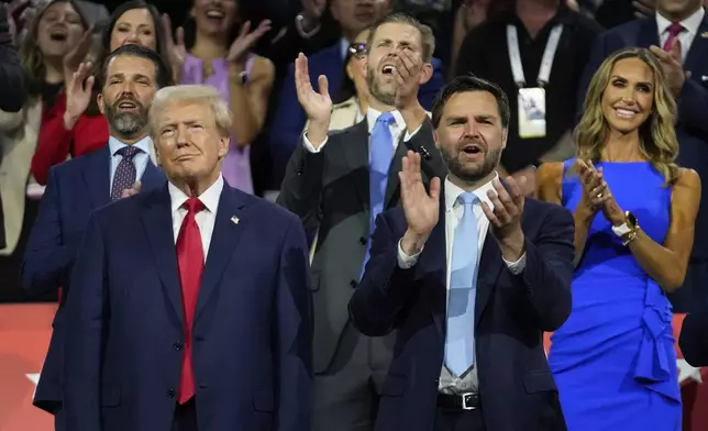 Republican presidential candidate former President Donald Trump appears with vice presidential candidate JD Vance, R-Ohio, during the Republican National Convention Monday, July 15, 2024, in Milwaukee. (AP Photo/Paul Sancya)