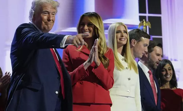 Republican presidential candidate former President Donald Trump, left, stands on stage with Melania Trump, Ivanka Trump, Jared Kushner and Republican vice presidential candidate Sen. JD Vance, R-Ohio, after speaking during the Republican National Convention, Thursday, July 18, 2024, in Milwaukee. (AP Photo/Julia Nikhinson)