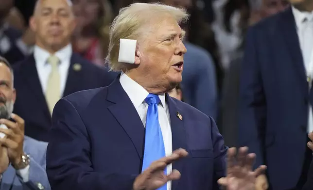 Republican presidential candidate former President Donald Trump is introduced during the Republican National Convention Tuesday, July 16, 2024, in Milwaukee. (AP Photo/Paul Sancya)