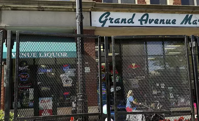 Outside ofDowntown Market and Avenue Liquor on Thursday, July 18, 2024, in Milwaukee, Wis. This week's Republican National Convention didn't deliver an overwhelming victory to some small businesses in downtown Milwaukee. There had been earlier promises of an economic boost, but some bars, convenience stores and restaurants along the edge of the secure zone sat largely empty all week. (AP Photo/Rio Yamat)