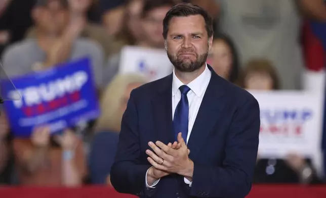 Republican vice presidential candidate Sen. JD Vance, R-Ohio, at a campaign rally, Saturday, July 27, 2024, in St. Cloud, Minn. (AP Photo/Adam Bettcher)