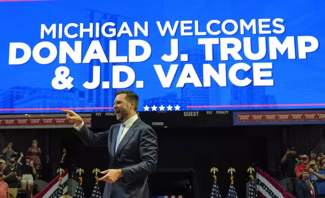 Republican vice presidential candidate Sen. JD Vance, R-Ohio, of Ohio arrives to speak before Republican presidential candidate former President Donald Trump at a campaign rally, Saturday, July 20, 2024, in Grand Rapids, Mich. (AP Photo/Evan Vucci)