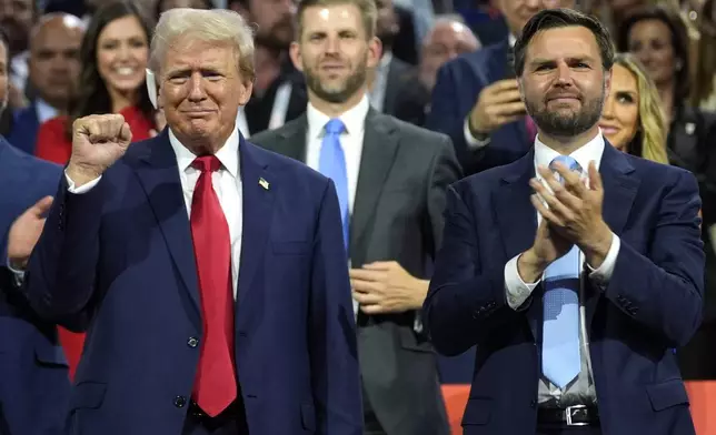 FILE - Republican presidential candidate former President Donald Trump, left, and Republican vice presidential candidate Sen. JD Vance, R-Ohio, attend the Republican National Convention, July 15, 2024, in Milwaukee. Trump is returning to the campaign trail in Michigan as he looks to win a second term in office. Trump has spent much of the week at the RNC and the trip to Michigan will be his first campaign event since an assassination attempt in Pennsylvania on July 13. (AP Photo/Evan Vucci, File)