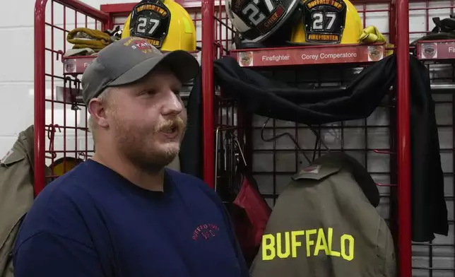 Firefighter Craig Cirrincione speaks during an interview next to the locker of Corey Comperatore at the Buffalo Township Fire Company 27 in Buffalo Township, Pa., Sunday, July 14, 2024. Comperatore was killed during a shooting at a campaign rally for Republican presidential candidate former President Donald Trump in Butler, Pa., on Saturday. (AP Photo/Sue Ogrocki)