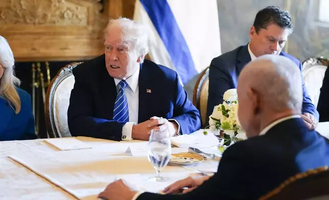 Republican presidential candidate former President Donald Trump meets with Israeli Prime Minister Benjamin Netanyahu, right, at his Mar-a-Lago estate, Friday, July 26, 2024, in Palm Beach, Fla. (AP Photo/Alex Brandon)