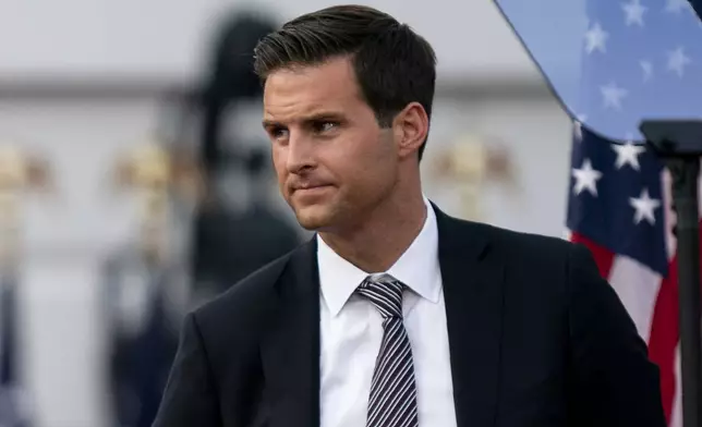 FILE - Director of the Presidential Personnel Office John McEntee is seen on the South Lawn of the White House, Aug. 27, 2020, in Washington. Former President Donald Trump is seeking to distance himself from a plan for a massive overhaul of the federal government drafted by some of his administration officials, including McEntee. Some of these men are expected to take high-level roles if the Republican presumptive nominee is elected back into the White House. Trump is saying on Truth Social that he "knew nothing about Project 2025." (AP Photo/Evan Vucci, File)