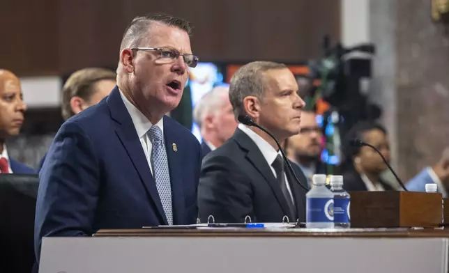 U.S. Secret Service Acting Director Ronald Rowe, left, and FBI Deputy Director Paul Abbate testify before a Joint Senate Committee on Homeland Security and Governmental Affairs and Senate Committee on the Judiciary hearing examining the security failures leading to the assassination attempt on Republican presidential candidate former President Donald Trump, Tuesday, July 30, 2024 in Washington. (AP Photo/Kevin Wolf)