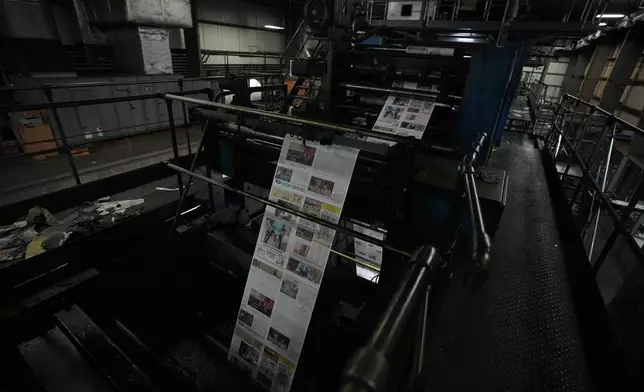 An edition of the Butler Eagle newspaper is run through the press, Thursday, July 18, 2024, in Butler, Pa. (AP Photo/Matt Slocum)