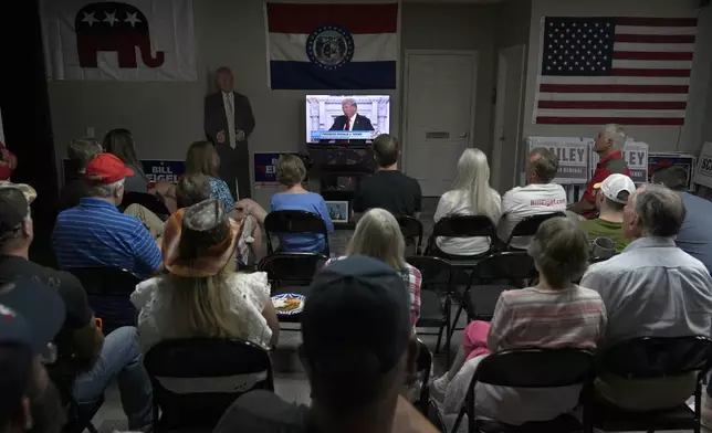 Supporters of Republican presidential candidate former President Donald Trump gather to watch a television broadcast of Trump's acceptance speech at the Republican National Convention, Thursday, July 18, 2024, in St. Charles, Mo. (AP Photo/Jeff Roberson)