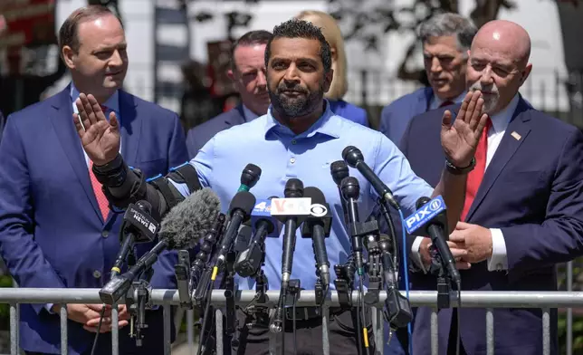FILE - Kash Patel speaks to reporters in a park across the street from former President Donald Trump's criminal trial in New York, Monday, May 20, 2024. (AP Photo/Seth Wenig, File)