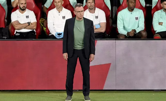Austria's head coach Ralf Rangnick follows the round of sixteen match between Austria and Turkey at the Euro 2024 soccer tournament in Leipzig, Germany, Tuesday, July 2, 2024. (Hendrik Schmidt/dpa via AP)