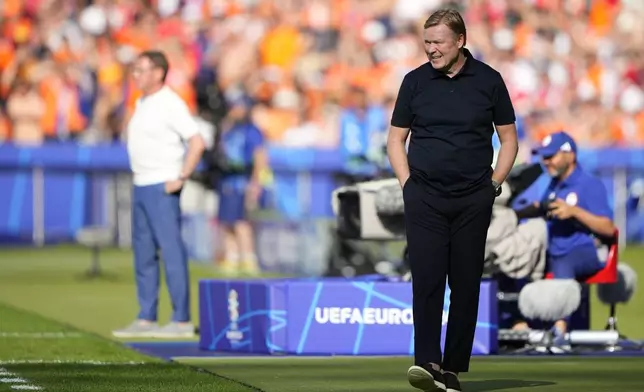 Netherlands head coach Ronald Koeman is seen during a Group D match between Netherlands and Austria at the Euro 2024 soccer tournament in Berlin, Germany, Tuesday, June 25, 2024. (AP Photo/Ebrahim Noroozi)