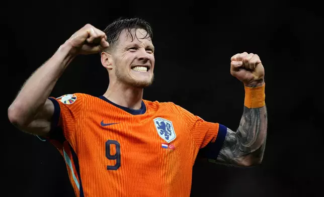 Wout Weghorst of the Netherlands celebrate at the end of a quarterfinal match between the Netherlands and Turkey at the Euro 2024 soccer tournament in Berlin, Germany, Saturday, July 6, 2024. (AP Photo/Ebrahim Noroozi)