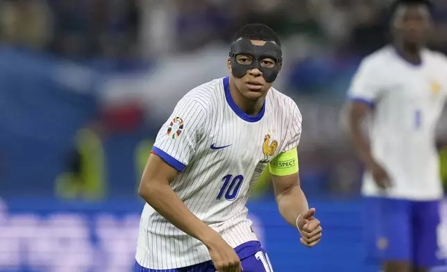 Kylian Mbappe of France during a quarter final match between Portugal and France at the Euro 2024 soccer tournament in Hamburg, Germany, Friday, July 5, 2024. (AP Photo/Martin Meissner)