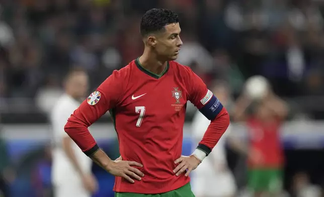 Portugal's Cristiano Ronaldo gestures during a round of sixteen match against Slovenia at the Euro 2024 soccer tournament in Frankfurt, Germany, Monday, July 1, 2024. (AP Photo/Antonio Calanni)
