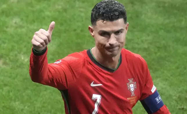 Portugal's Cristiano Ronaldo is seen after the win against Slovenia during a round of sixteen match between Portugal and Slovenia at the Euro 2024 soccer tournament in Frankfurt, Germany, Monday, July 1, 2024. (AP Photo/Michael Probst)