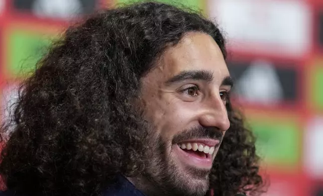 Spain's Marc Cucurella attends a press conference ahead of Tuesday's Euro 2024, semifinal soccer match against France in Donaueschingen, Germany, Sunday, July 7, 2024. (AP Photo/Manu Fernandez)