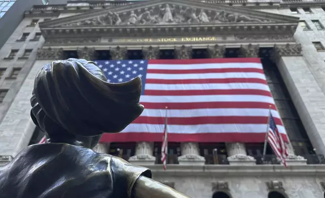 FILE - The Fearless Girl statues faces the New York Stock Exchange on July 2, 2024, in New York. (AP Photo/Peter Morgan)