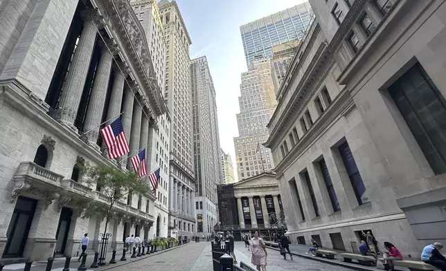 The New York Stock Exchange, left, is shown on Wednesday, July 10, 2024, in New York. Shares have opened higher in Europe after most markets in Asia declined, although Tokyo's Nikkei 225 index closed at another record high (AP Photo/Peter Morgan)