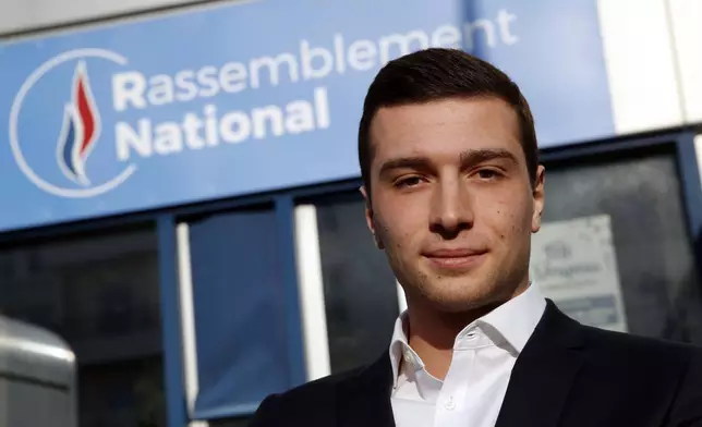 FILE - Head of Marine Le Pen's party list for the European Parliament elections, Jordan Bardella poses after an interview with Associated Press in Nanterre, outside Paris, Wednesday, Feb. 20, 2019. At just 28 years old, Jordan Bardella has led the French far right to a landslide victory in the European Parliament election in June. After voters propelled Marine Le Pen's National Rally to a strong lead in the first round of national legislative elections on Sunday, Bardella has turned to rallying supporters to grant Marine Le Pen's party an absolute majority in the decisive round of voting on July 7 and make him the prime minister of France. (AP Photo/Christophe Ena, File)