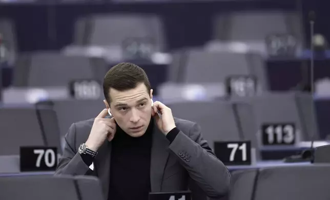 FILE - French Far-right party National Rally president Jordan Bardella attends a session at the European Parliament, Tuesday, Jan. 16, 2024 in Strasbourg, eastern France. At just 28 years old, Jordan Bardella has led the French far right to a landslide victory in the European Parliament election in June. After voters propelled Marine Le Pen's National Rally to a strong lead in the first round of national legislative elections on Sunday, Bardella has turned to rallying supporters to grant Marine Le Pen's party an absolute majority in the decisive round of voting on July 7 and make him the prime minister of France. (AP Photo/Jean-Francois Badias, File)