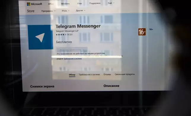 FILE - The website of the Telegram messaging app is seen on a computer's screen in Moscow, Russia, Friday, April 13, 2018. Cybersecurity experts and French officials say Russian disinformation campaigns against France are zeroing in on legislative elections and the Olympic Games which open in Paris at the end of the month. (AP Photo/Alexander Zemlianichenko, File)