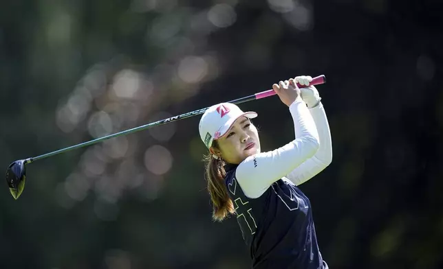 Ayaka Furue, of Japan, plays on the fourth hole during the last round of the Evian Championship women's golf tournament, in Evian, eastern France, Sunday, July 14, 2024. (AP Photo/Laurent Cipriani)