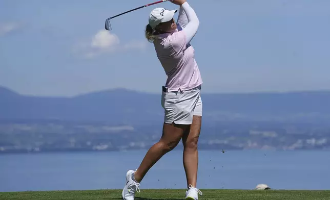 Lauren Coughlin, of USA, plays on the 5th hole during the last round of the Evian Championship women's golf tournament, in Evian, eastern France, Sunday, July 14, 2024. (AP Photo/Laurent Cipriani)