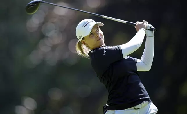 Stephanie Kyriacou, of Australia, plays on the fourth hole during the last round of the Evian Championship women's golf tournament, in Evian, eastern France, Sunday, July 14, 2024. (AP Photo/Laurent Cipriani)