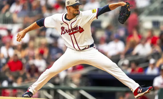 Atlanta Braves pitcher Charlie Morton throws during the first inning of a baseball game against the San Francisco Giants, Thursday, July 4, 2024, in Atlanta. (AP Photo/Jason Allen)
