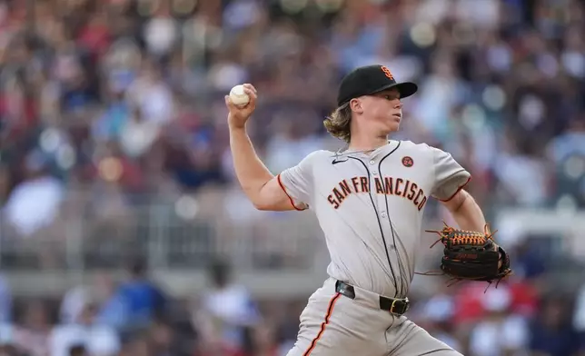 San Francisco Giants pitcher Hayden Birdsong (60) delivers in the first inning of a baseball game against the Atlanta Braves, Tuesday, July 2, 2024, in Atlanta. (AP Photo/Brynn Anderson)