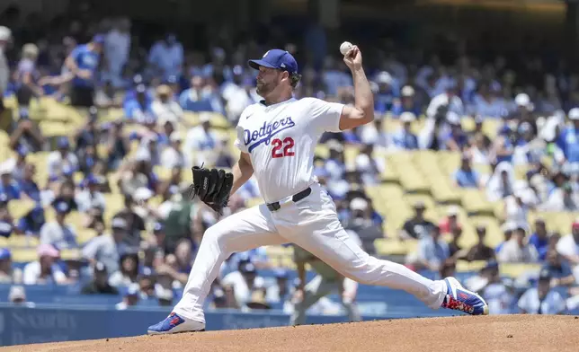 Los Angeles Dodgers starting pitcher Clayton Kershaw (22) throws during the first inning of a baseball game against the San Francisco Giants in Los Angeles, Thursday, July 25, 2024. (AP Photo/Eric Thayer)