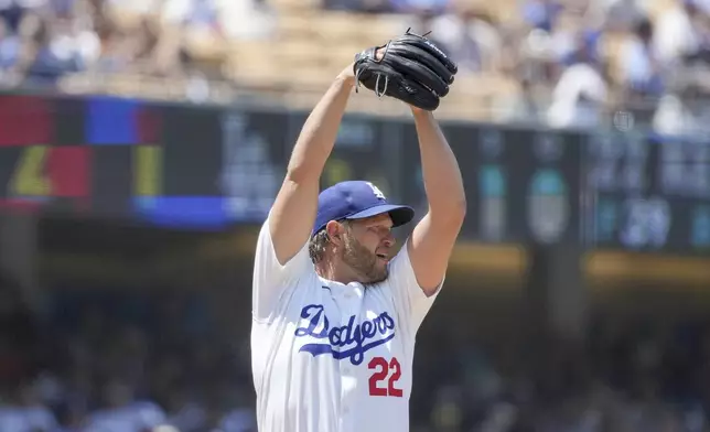 Los Angeles Dodgers starting pitcher Clayton Kershaw (22) winds up during the third inning of a baseball game against the San Francisco Giants in Los Angeles, Calif., Thursday, July 25, 2024. (AP Photo/Eric Thayer)