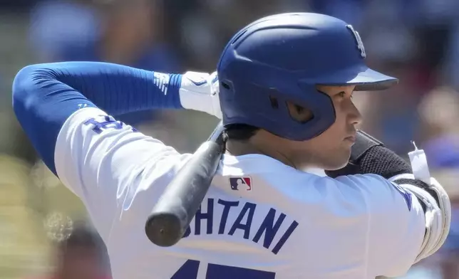 Los Angeles Dodgers designated hitter Shohei Ohtani prepares to swing during the fourth inning of a baseball game against the San Francisco Giants in Los Angeles, Thursday, July 25, 2024. (AP Photo/Eric Thayer)