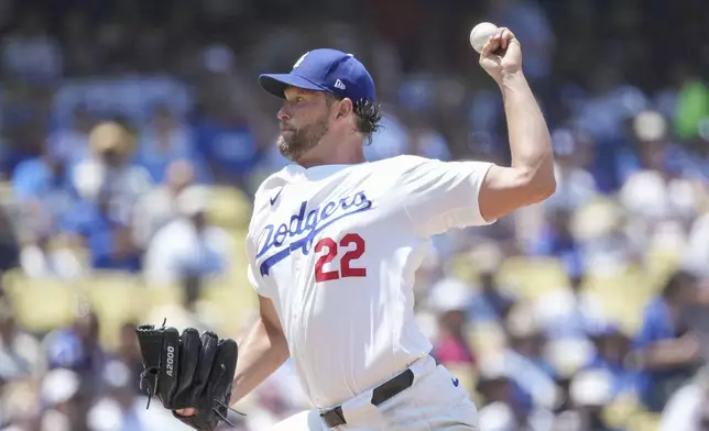 Los Angeles Dodgers starting pitcher Clayton Kershaw (22) throws a pitch during the third inning of a baseball game against the San Francisco Giants in Los Angeles, Calif., Thursday, July 25, 2024. (AP Photo/Eric Thayer)