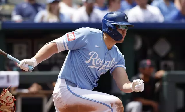 Kansas City Royals' Hunter Renfroe follows through on an RBI single during the fifth inning of a baseball game against the Cleveland Guardians in Kansas City, Mo., Sunday, June 30, 2024. (AP Photo/Colin E. Braley)