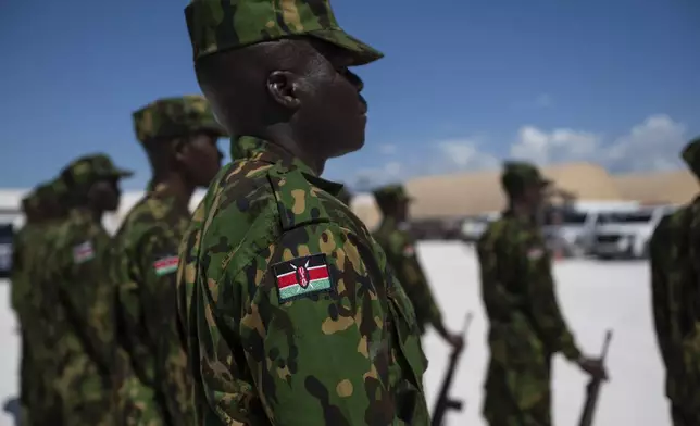 Kenyan police part of a UN-backed multinational force stand in formation at their base during a visit by U.S. Ambassador to the United Nations Linda Thomas-Greenfield, in Port-au-Prince, Haiti, Monday, July 22, 2024. (Roberto Schmidt/Pool Photo via AP)