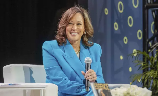 Vice President Kamala Harris speaks with Essence CEO Caroline Wanga during the 30th annual Essence Festival of Culture in New Orleans, Saturday, July 6, 2024. (Matthew Perschall/The Times-Picayune/The New Orleans Advocate via AP)