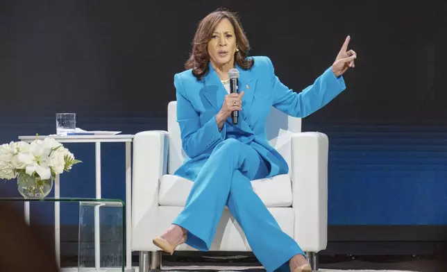 Vice President Kamala Harris speaks with Essence CEO Caroline Wanga during the 30th annual Essence Festival of Culture in New Orleans, Saturday, July 6, 2024. (Matthew Perschall/The Times-Picayune/The New Orleans Advocate via AP)