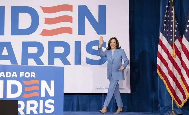 Vice President Kamala Harris takes the stage to speak at a post debate campaign rally, Friday, June 28, 2024, in Las Vegas. (AP Photo/Ronda Churchill)