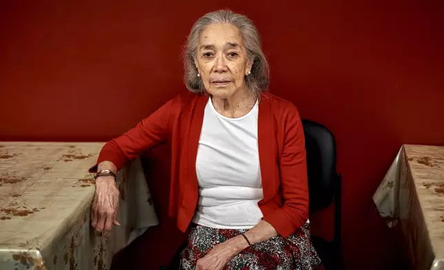 Jane Orendain, 84 poses for a photograph at a cooling center during a hot day, Friday, June 21, 2024, in the Bronx Borough of New York. The heat isn’t just uncomfortable. It’s the top cause of weather-related fatalities nationwide, quietly killing an average of 350 New Yorkers each year, according to a city mortality report.(AP Photo/Andres Kudacki)