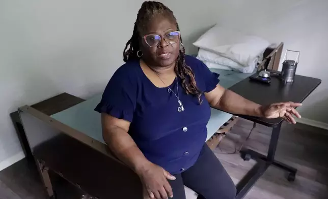 Janet Jarrett in the bedroom of her sister, Pamela Jarrett, who passed away after suffering heat related distress due to the power outage caused by hurricane Beryl, Friday, July 19, 2024, in Spring, Texas. (AP Photo/Michael Wyke)