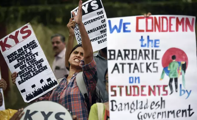 Activists of All India Democratic Students' Organisation (AIDSO) shout slogans in solidarity with protesting students in Bangladesh, at a protest gathering in New Delhi, India, Friday, July 19, 2024. (AP Photo)