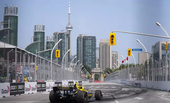 Colton Herta, of the United States, drives during an IndyCar auto race in Toronto, Sunday, July 21, 2024. (Arlyn McAdorey/The Canadian Press via AP)