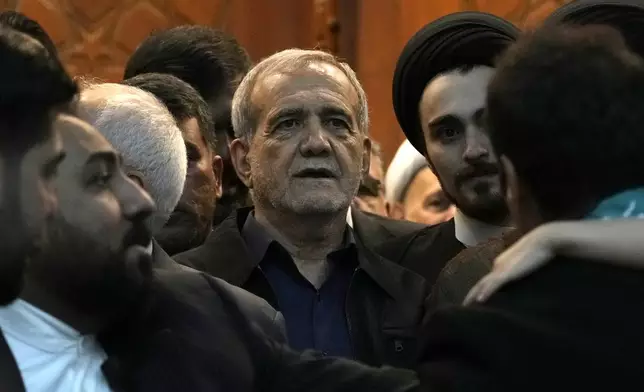 Iran's President-elect Masoud Pezeshkian arrives to attend a meeting a day after the presidential election, at the shrine of the late revolutionary founder Ayatollah Khomeini, just outside Tehran, Iran, Saturday, July 6, 2024. (AP Photo/Vahid Salemi)