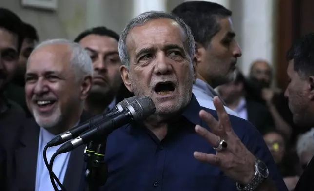 Iran's President-elect Masoud Pezeshkian speaks in a meeting a day after the presidential election, at the shrine of the late revolutionary founder Ayatollah Khomeini, just outside Tehran, Iran, Saturday, July 6, 2024. (AP Photo/Vahid Salemi)