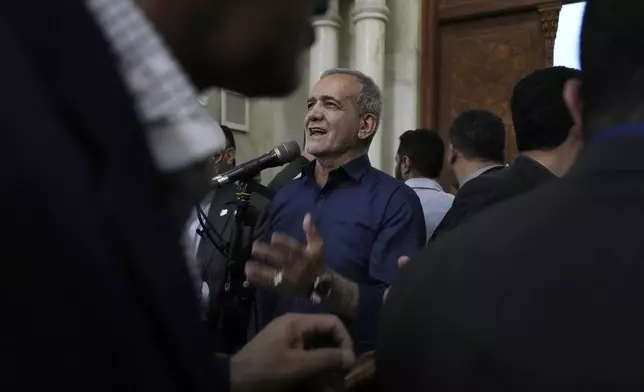 Iran's President-elect Masoud Pezeshkian speaks in a meeting a day after the presidential election, at the shrine of the late revolutionary founder Ayatollah Khomeini, just outside Tehran, Iran, Saturday, July 6, 2024. (AP Photo/Vahid Salemi)